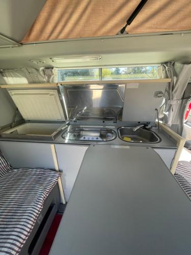 A kitchen or kitchenette at Camper car in underground parking