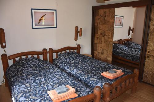 Säng eller sängar i ett rum på Boróka Tanya