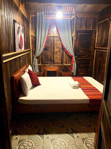 Krevet ili kreveti u jedinici u okviru objekta Puluong Bao Gia Homestay