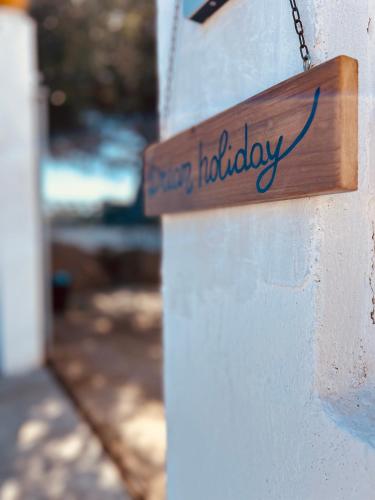 a sign that reads fire introductory hanging on a wall at Dream Holiday in Marina di Lizzano