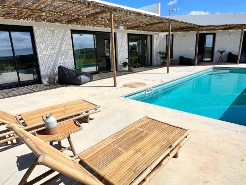 Billede fra billedgalleriet på Villa con piscina en Golf Isla Canela Links i Ayamonte