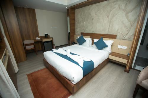 Katil atau katil-katil dalam bilik di Maya Boutique Hotel