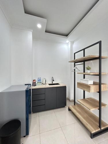 Η κουζίνα ή μικρή κουζίνα στο Sunnydays homestay