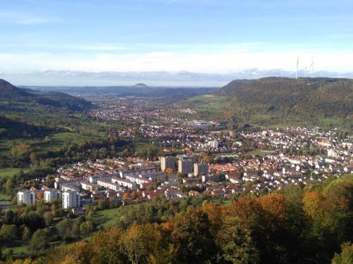 an aerial view of a city in the hills at Gemütliche Ferienwohnung mit Wellnessbad in Geislingen an der Steige