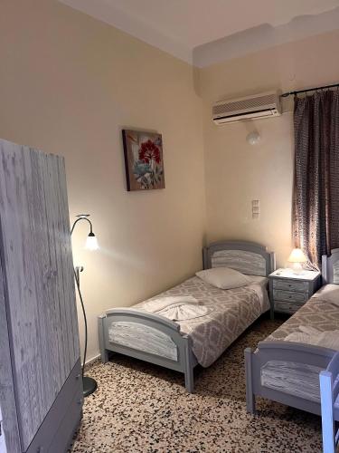Postel nebo postele na pokoji v ubytování Alinda Hotel