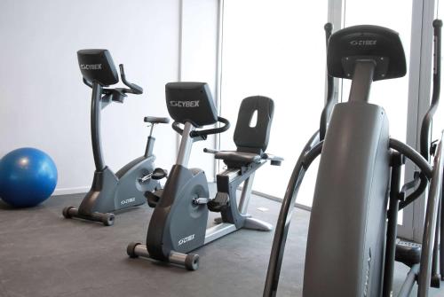 a row of exercise bikes in a gym at Dazzler by Wyndham Buenos Aires Recoleta in Buenos Aires