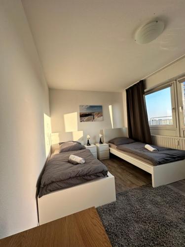 Легло или легла в стая в Maisonette Penthouse Laatzen - 5 min to Messe