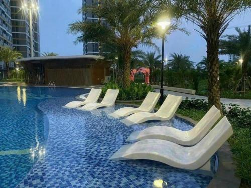 Bazén v ubytování Resort Ori Vinhomes Grand Park tp Thủ Đức , 3giường 2WC nebo v jeho okolí
