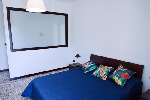 Ένα ή περισσότερα κρεβάτια σε δωμάτιο στο Strelitzia Home