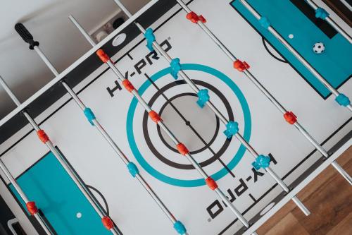 a cake for a soccer team with a target on it at Exquisite Mcr City Centr Gem - Foosball - Sleeps11 in Manchester
