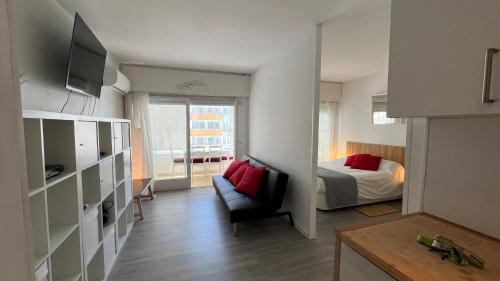 Ένα ή περισσότερα κρεβάτια σε δωμάτιο στο Apartamiento vista al Mar - Holiday center en Roses