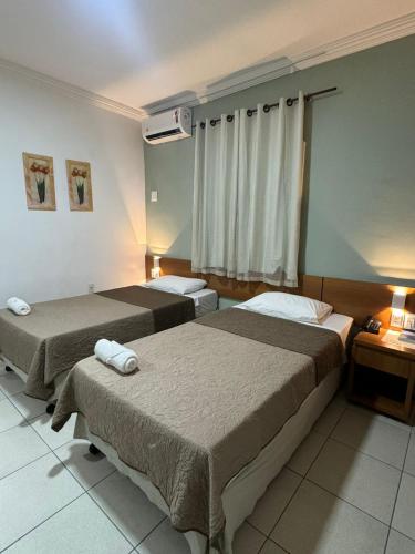 Katil atau katil-katil dalam bilik di Hotel Cocal