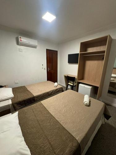 Katil atau katil-katil dalam bilik di Hotel Cocal