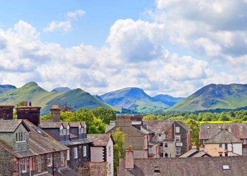 a view of a town with mountains in the background at Keswick View in Keswick