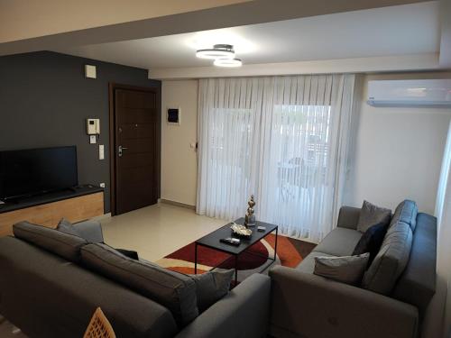 Фотография из галереи ALEXANDRA BOUTIQUE RESIDENCE Garden Apartment в городе Александруполис