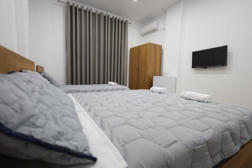 Postel nebo postele na pokoji v ubytování Guesthouse Aurel