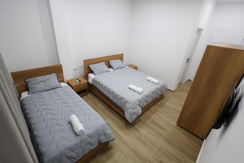 Postel nebo postele na pokoji v ubytování Guesthouse Aurel