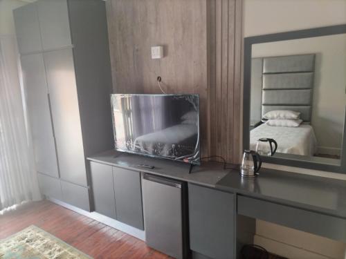 Kuchyň nebo kuchyňský kout v ubytování Lukhanya Guesthouse