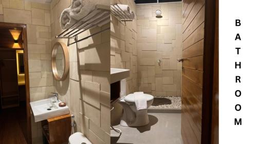 een badkamer met een wastafel en een toilet bij Villa Morphosis in Berpodak