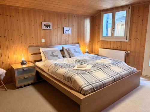 Postel nebo postele na pokoji v ubytování Appartement Cosy - Chalet Central