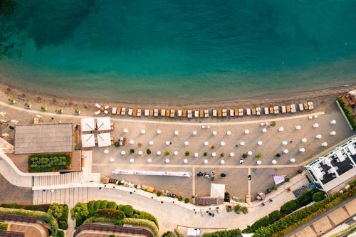 an overhead view of a beach with the ocean at Dukley Hotel & Resort in Budva
