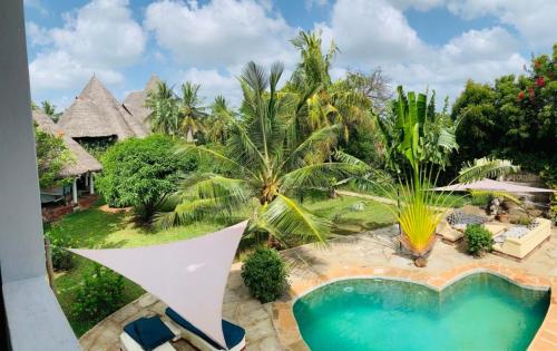 an aerial view of a resort with a swimming pool at Villa Simba in Galu