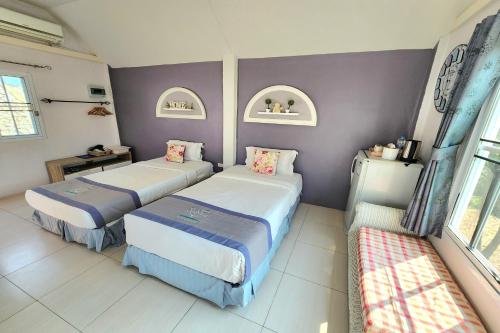 เตียงในห้องที่ See Sky Resort
