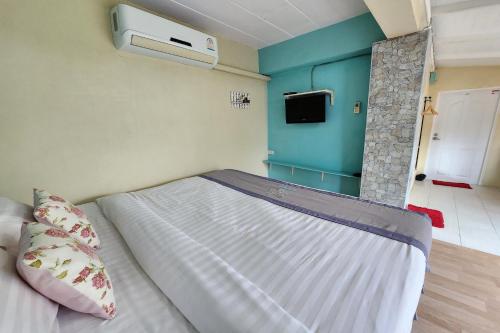 เตียงในห้องที่ See Sky Resort