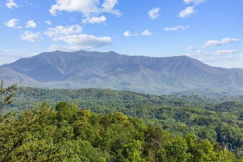 a view of a mountain range with trees and mountains at Four-Bedroom Holiday Home in Pigeon Forge