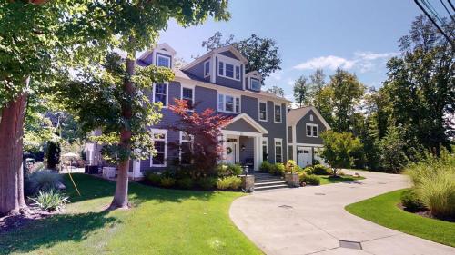 a large house with a driveway at Lamb Haven in South Haven