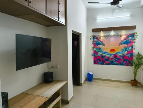 TV a/nebo společenská místnost v ubytování Calcutta Backpackers