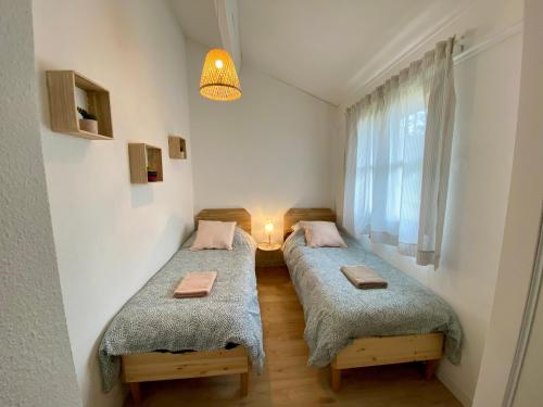 Postel nebo postele na pokoji v ubytování Agréable maison rénovée