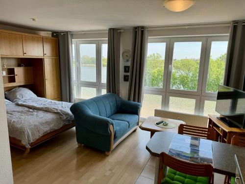 Ένα ή περισσότερα κρεβάτια σε δωμάτιο στο Apartement Seeblick