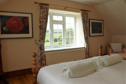 Postel nebo postele na pokoji v ubytování Rookley Farm Lodge - Pet friendly