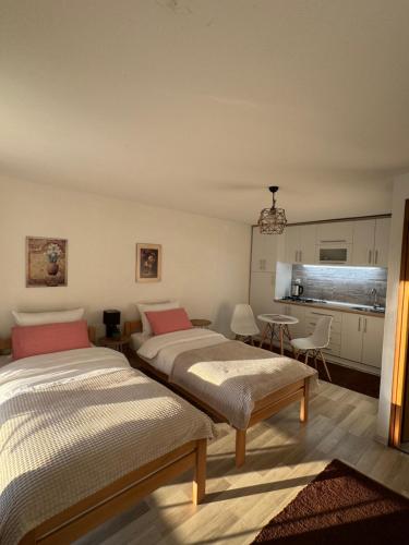 Llit o llits en una habitació de Perla Accommodation