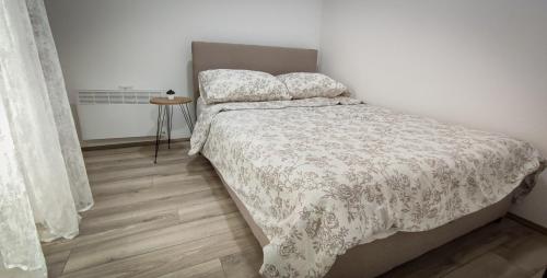 Postel nebo postele na pokoji v ubytování Apartman Radovanović