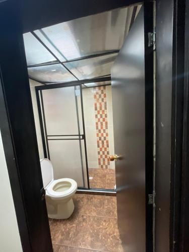 Ванная комната в Habitación con baño privado para 1 o 2 personas