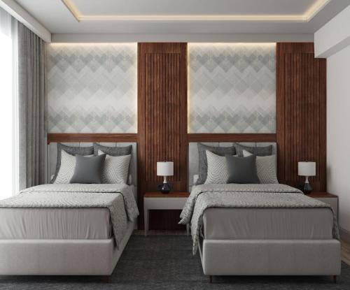 Ένα ή περισσότερα κρεβάτια σε δωμάτιο στο Marvelous Hotel