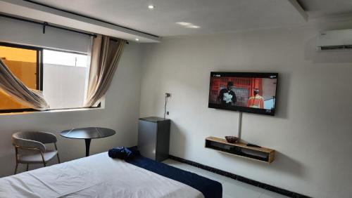 Llit o llits en una habitació de Koluti Apartments