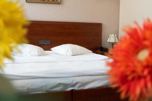Ένα ή περισσότερα κρεβάτια σε δωμάτιο στο Park Avenue Hotel Yerevan