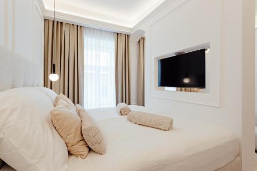A bed or beds in a room at Anima Mea