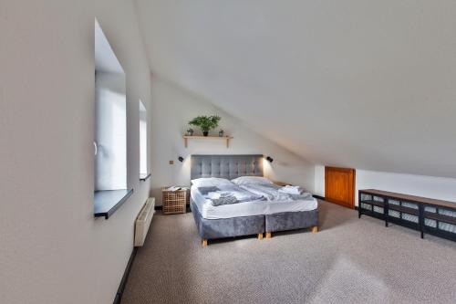 Ένα ή περισσότερα κρεβάτια σε δωμάτιο στο Hotel Zerrenpach Látky