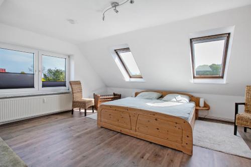 TV a/nebo společenská místnost v ubytování Ferienwohnung Fraulund