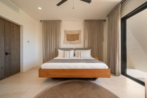 1 Homes Preview Caboにあるベッド