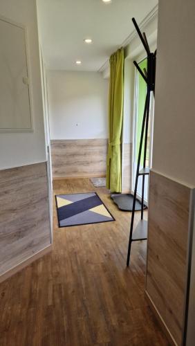 a room with mats on the floor and a ladder at Ferienwohnung Vier Pfoten in Willingen