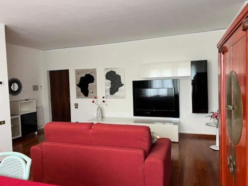 TV a/nebo společenská místnost v ubytování Suite Piero della Francesca