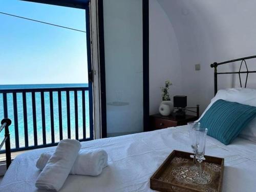 Postel nebo postele na pokoji v ubytování Μεζονέτα - Παραλία Αγία Φωτεινή