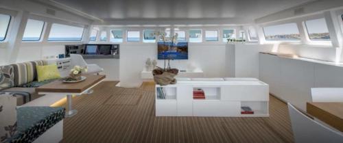 a rendering of a living room in a yacht at Luxury catamarano 20 meters in Marina di Portisco