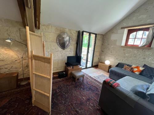 Χώρος καθιστικού στο Proche Beauval appartement 60m2 avec mezzanine et petite terrasse