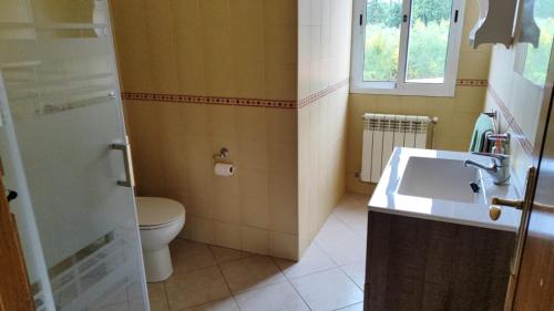 Koupelna v ubytování Casa de campo tranquila en vilar cerca de santiago